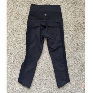 Lululemon Black crop leggings 20” inseam with full leg cutouts size 4